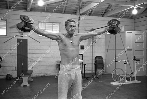 Steve McQueen working out in the weight room 8b20-19048