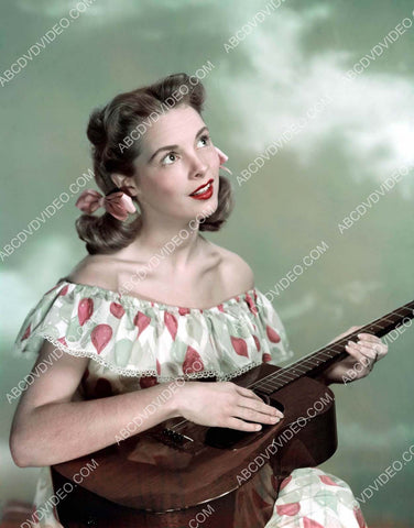 Janet Leigh strumming on the guitar 8b20-19169