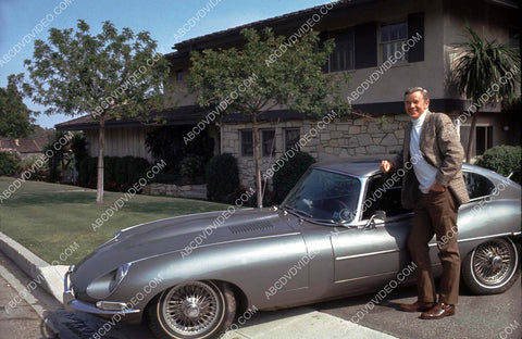 Marshall Thompson and his Jaguar automobile 8b20-19963