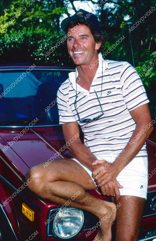 Peter Brown sitting on his new VW Rabbit automobile 8b20-20058