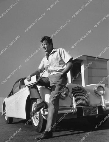 Roger Moore and his slick new automobile 8b20-20093