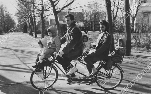Pat Boone and the family really load up a bicycle 8b20-20285
