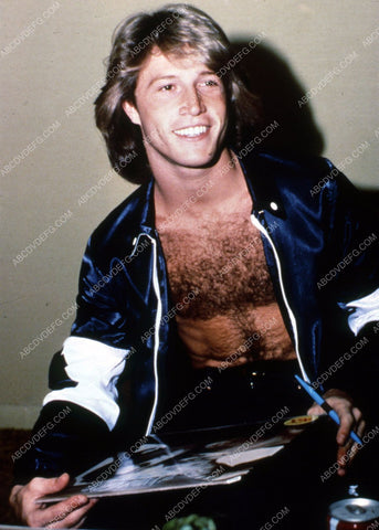 Andy Gibb signing album for fan 8b20-2030