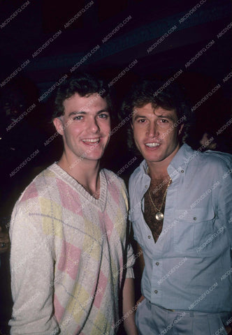 Andy Gibb and friend at some public function 8b20-2039