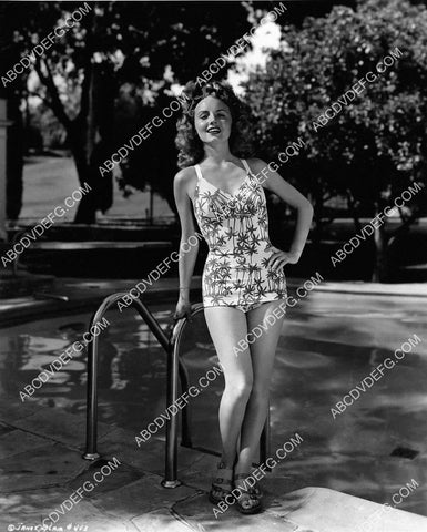 beautiful Janet Blair modeling her new swimsuit by the pool 8b20-20452