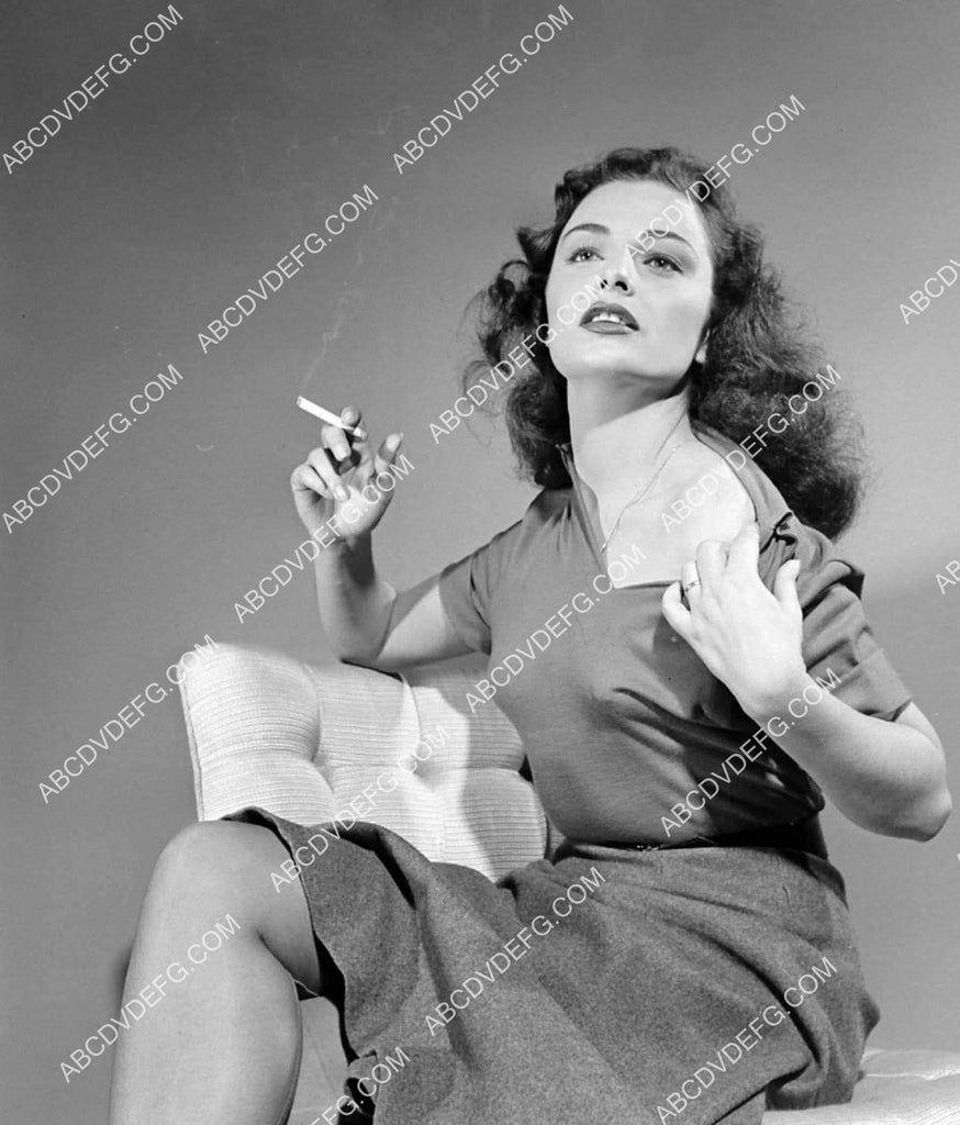 Marina Berti enjoying a cigarette 8b20-20595 Marina Berti enjoying a cigarette 8b20-20595