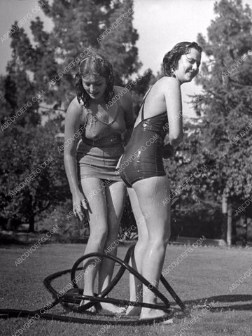 Ann Rutherford & friend soaking wet playing in the sprinklers 8b20-2408