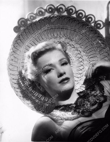 Anne Baxter in wicker chair portrait 8b20-2475