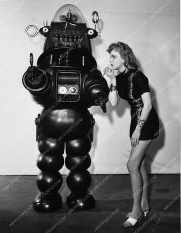 Robby the Robot holds mirror for Anne Francis makeup check 8b20-2571