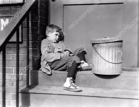 Our Gang Scotty Beckett sitting on the sateps 8b20-2782