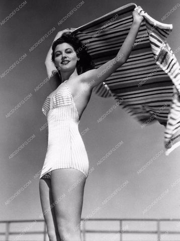 Ava Gardner sporting her new swimwear gets the sand out of her towel 8b20-3140