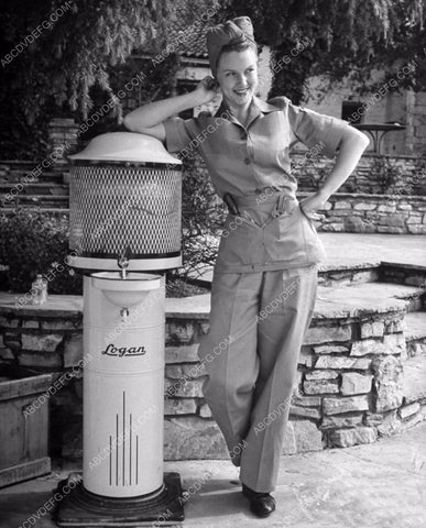 Barbara Britton preparing for party w tree warmer maybe 8b20-3242