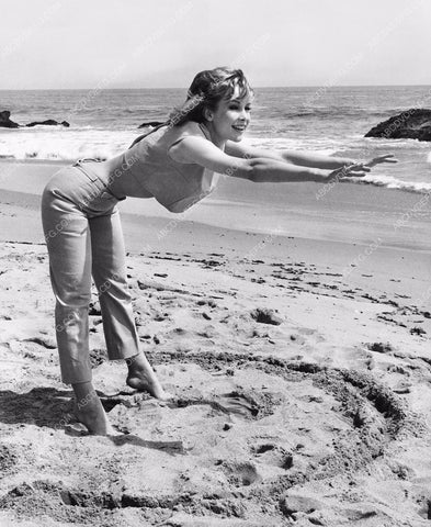 stunning Barbara Eden doing some exercises on the beach dp-3262