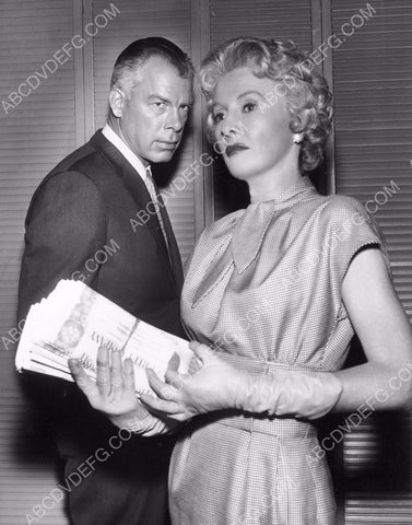 Lee Marvin giving Barbara Stanwyck the suspicious eye 8b20-3524