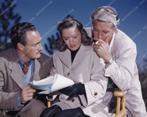 candid Barbara Stanwyck cast crew go over script between scenes 8b20-3552