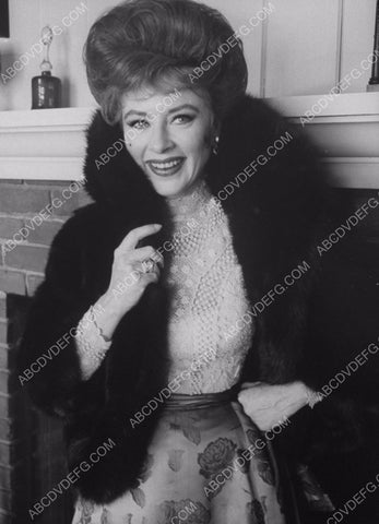 Amanda Blake in fur in front of the fireplace 8b20-3718