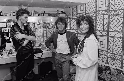 candid Andy Gibb in dressing with others 8b20-3787