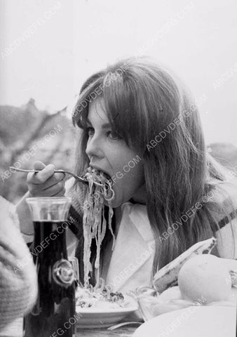 candid Ann-Margret puts away some spaghetti between takes 8b20-4096