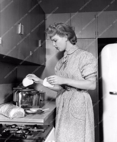 candid Anne Francis makes a little toast in the kitchen 8b20-4199
