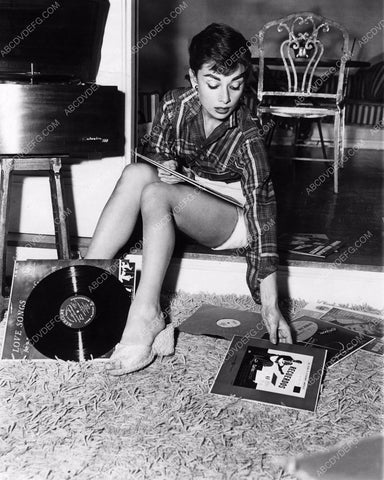 candid Audrey Hepburn listens to some records 8b20-4553