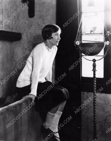 Bessie Love looking at her parakeet 8b20-4606