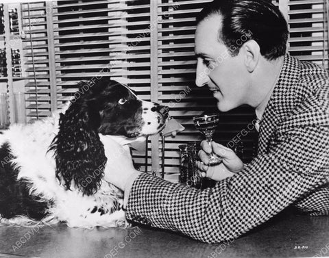 candid Basil Rathbone at home with his dog 8b20-4672