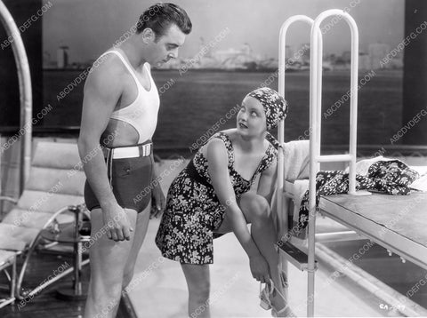 Bette Davis strapping on her sandles unknown film 8b20-4747