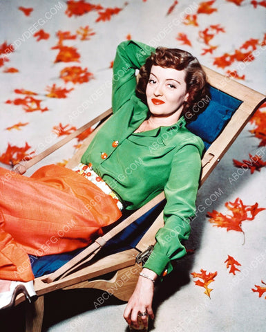 Bette Davis relaxing in lounge chair portrait 8b20-4772