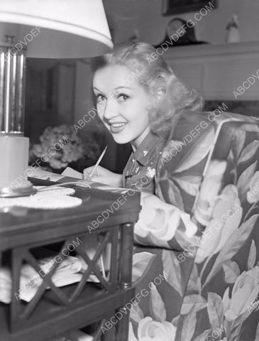 candid Betty Grable writing a letter 8b20-4809