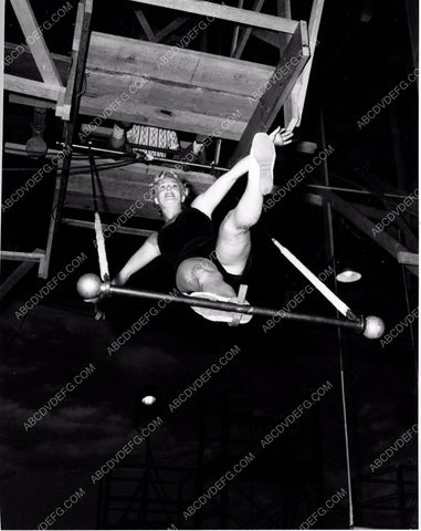 athletic Betty Hutton practices on circus trapeze swing 8b20-4912