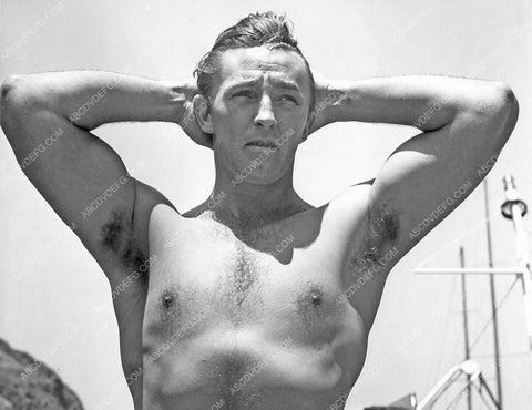 shirtless Robert Mitchum displays beefcake qualities 8b20-5014