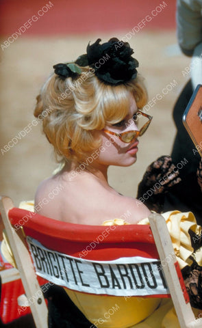 candid Brigitte Bardot sitting in her chair 8b20-5252