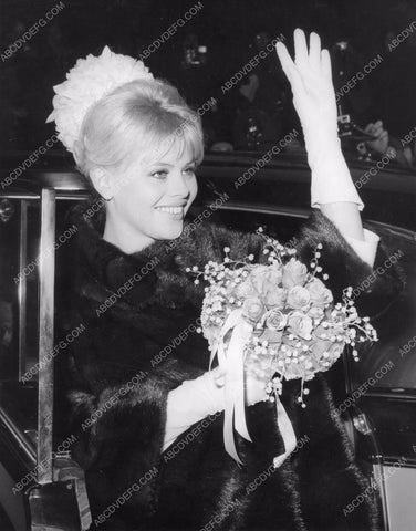 candid Britt Ekland arrives and is greeted by fans 8b20-5439
