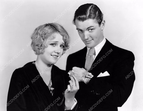 Anita Page and guy with cool sun-dial watch 8b20-5689