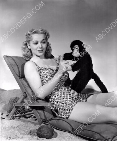 gorgeous Carole Landis in swimwear with stuffed monkey 8b20-5909