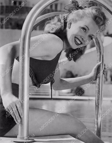 gorgeous Carole Landis sitting by the pool 8b20-5920