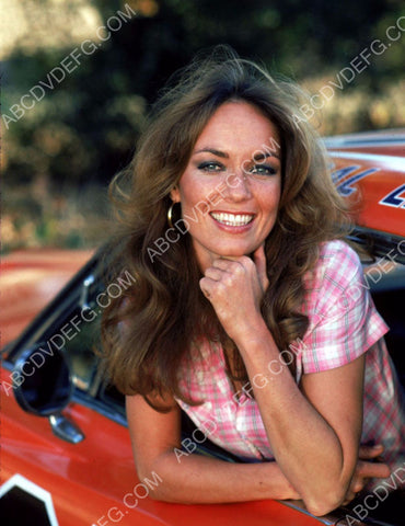 Catherine Bach hanging out of The General Lee Dukes of Hazzard 8b20-6245