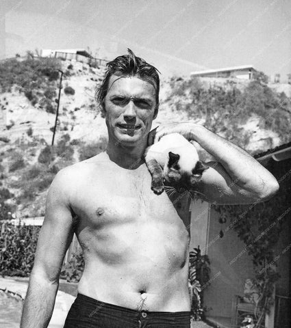 Clint Eastwood with his siamese cat in the backyard 8b20-6338