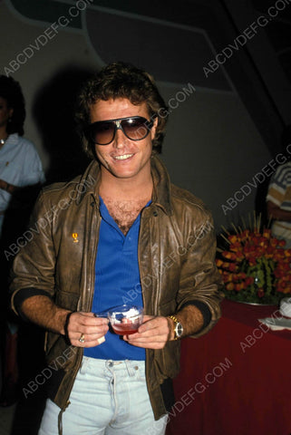 Andy Gibb sampling the fruit punch 8b20-6560