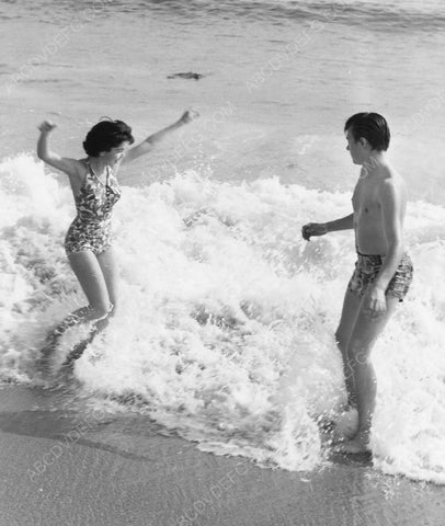 Annette Funicello and someone in swimwear in the waves 8b20-6787