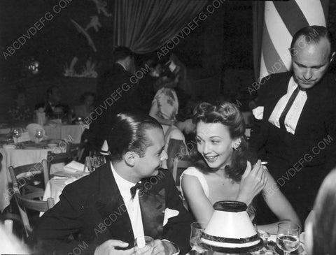 candid Carole Landis dining w looks like Roberrt Montgomery 8b20-6876
