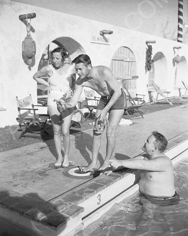 Charles Laughton Elsa Lanchester and friend play horseshoes by the pool 8b20-6894
