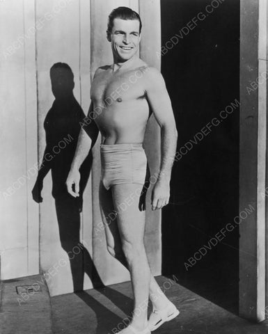 Buster Crabbe showing off beefcake physique 8b20-6996