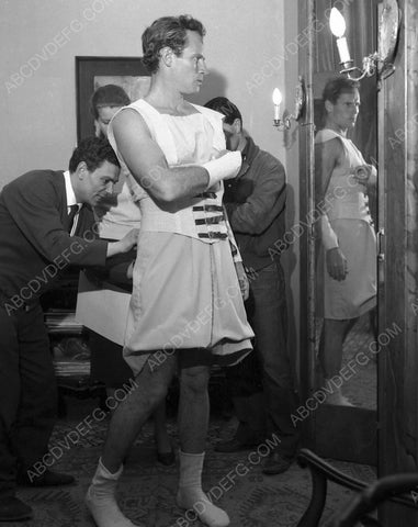 candid Charlton Heston gets wardrobe fitting 8b20-7016