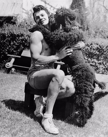 Cornel Wilde playing with his dog 8b20-7118