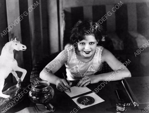 Clara Bow working at her desk 8b20-7644