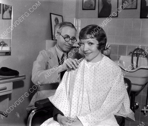 Claudette Colbert in makeup chair getting haircut 8b20-7690