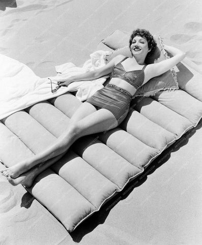 beautiful Claudette Colbert in swimwear sunbathing 8b20-7727