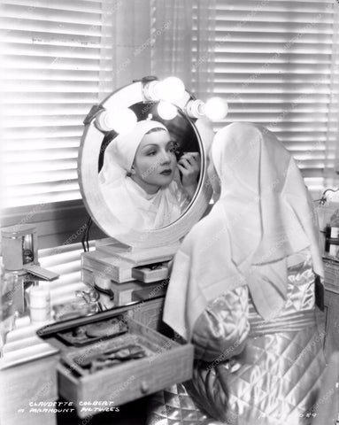 Claudette Colbert sitting at her makeup table 8b20-7764