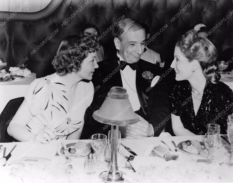 candid Claudette Colbert dining out with friends 8b20-7773